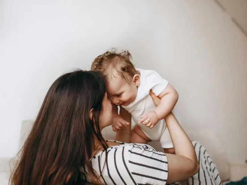 Family in London considering childcare options between an au pair and a professional nanny