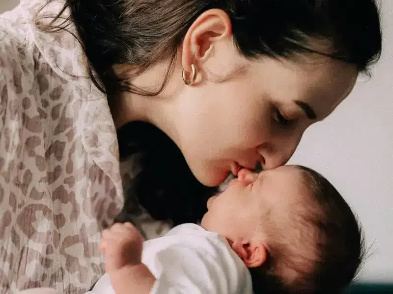 New mother recovering after birth in a calm home environment in London with professional childcare support